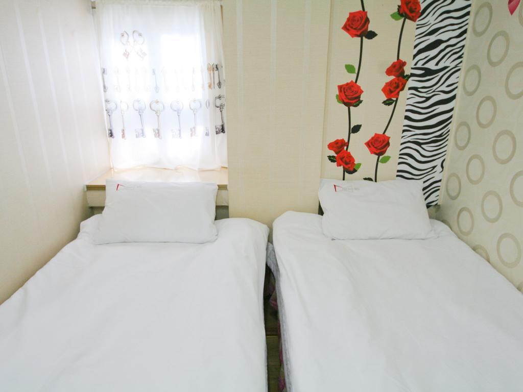 Guesthouse Myeongdong Seoul Rum bild